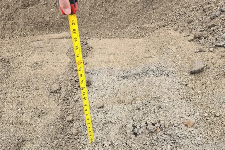 Measuring the depth of a hole for leveling the ground